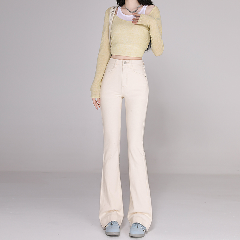 2025春季新款杏色微喇叭牛仔裤女设计感高腰修身显瘦拖地裤子