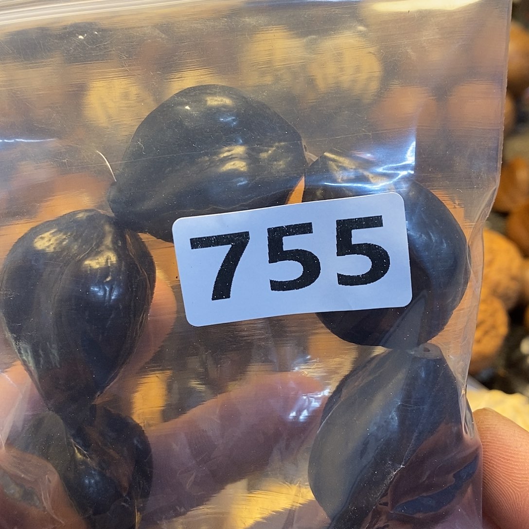 橄榄核吊坠继*文化交流