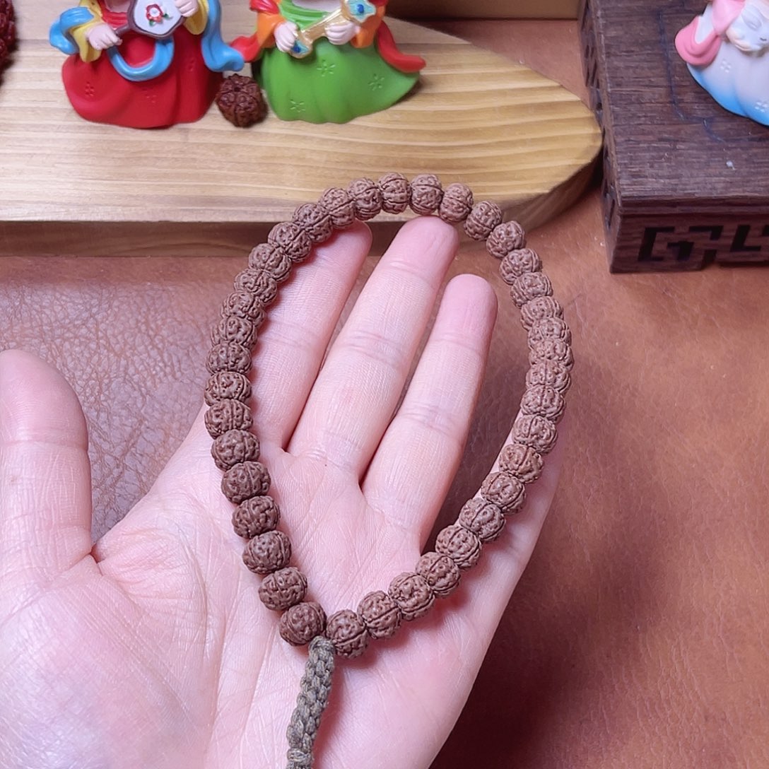 文玩核桃吊坠老树王手持