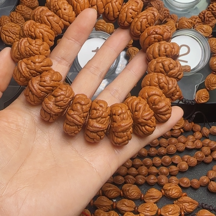 楚***意桃核手串龙纹桃核