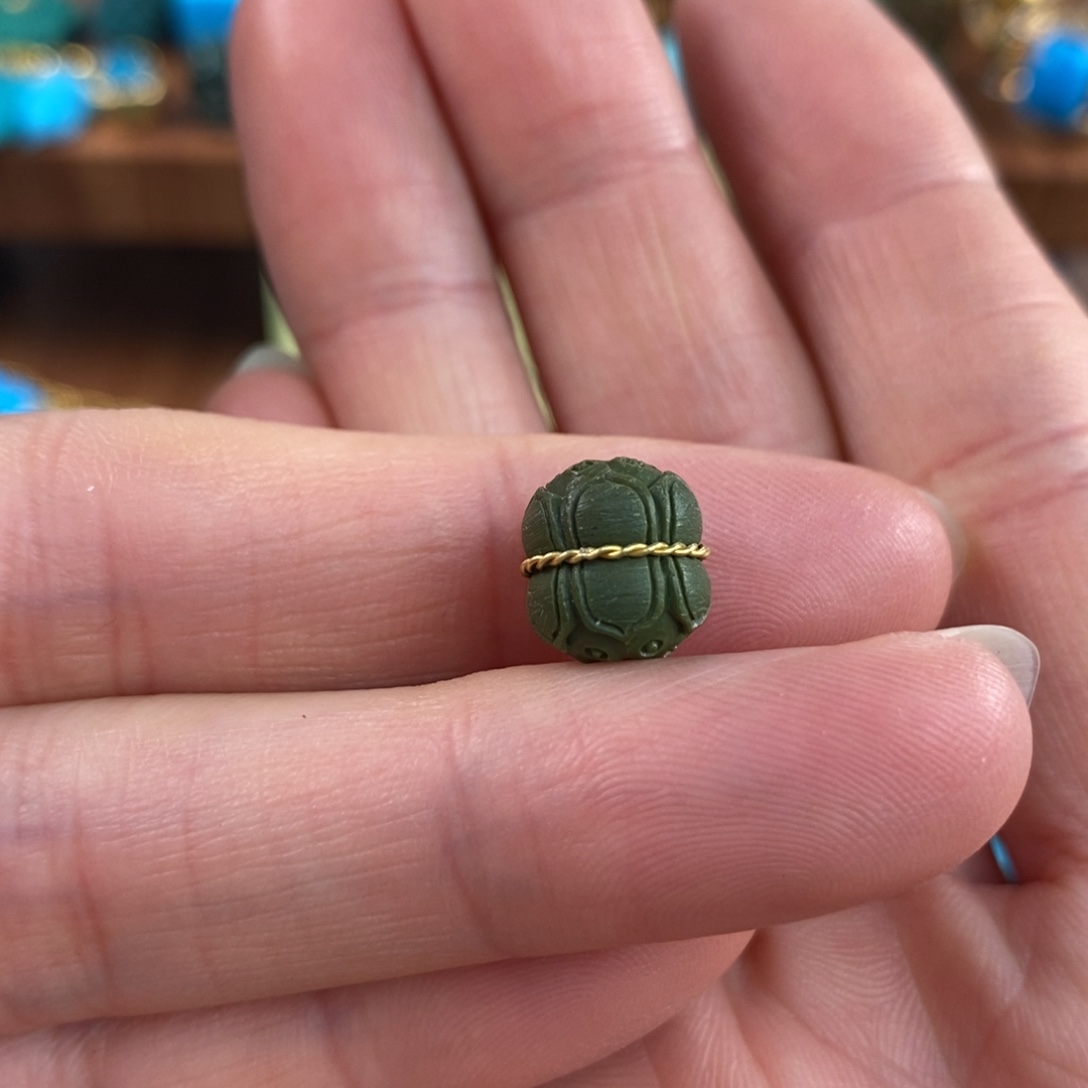 绿松石未镶嵌。老油绿并蒂莲