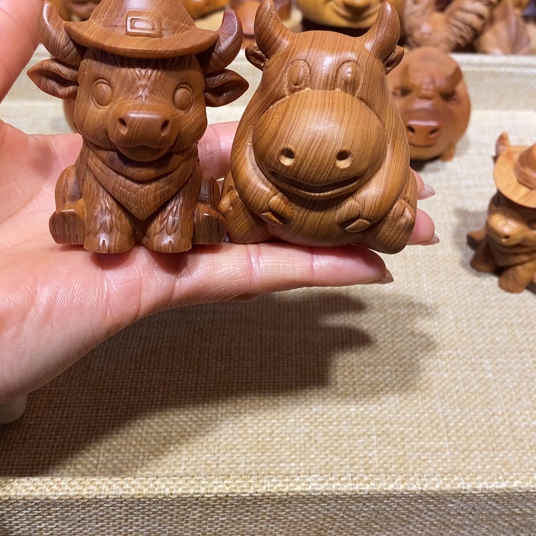柏木（崖柏）E****l崖柏手把件，牛x2