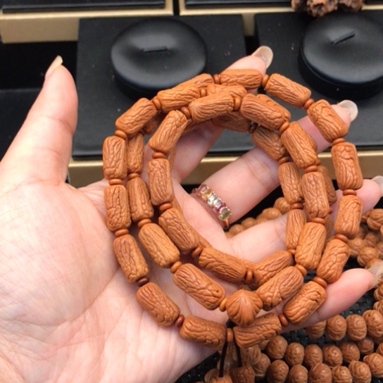 韋***吊坠桃核桶珠金条