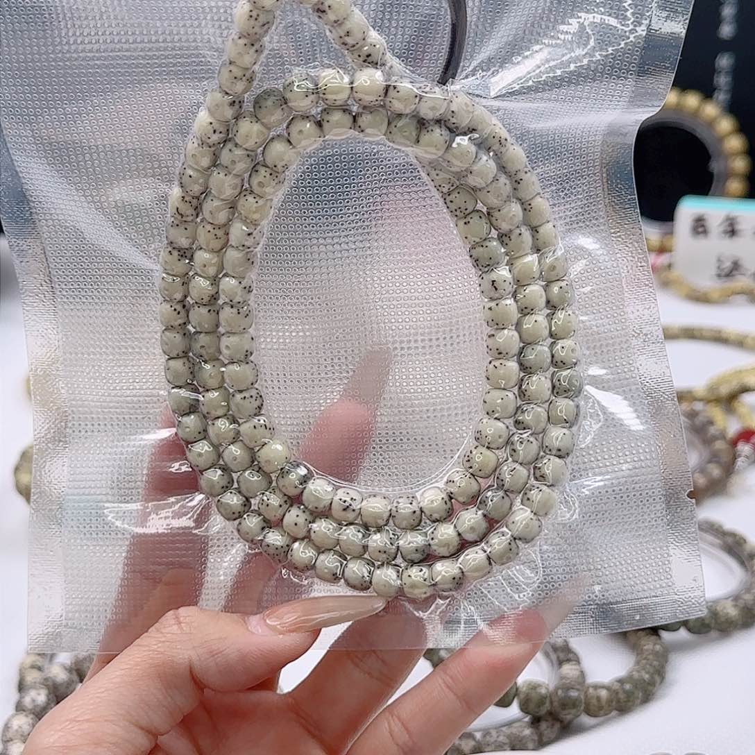 哈*嗝原生态石玉留白7×6同枝果精抛120颗