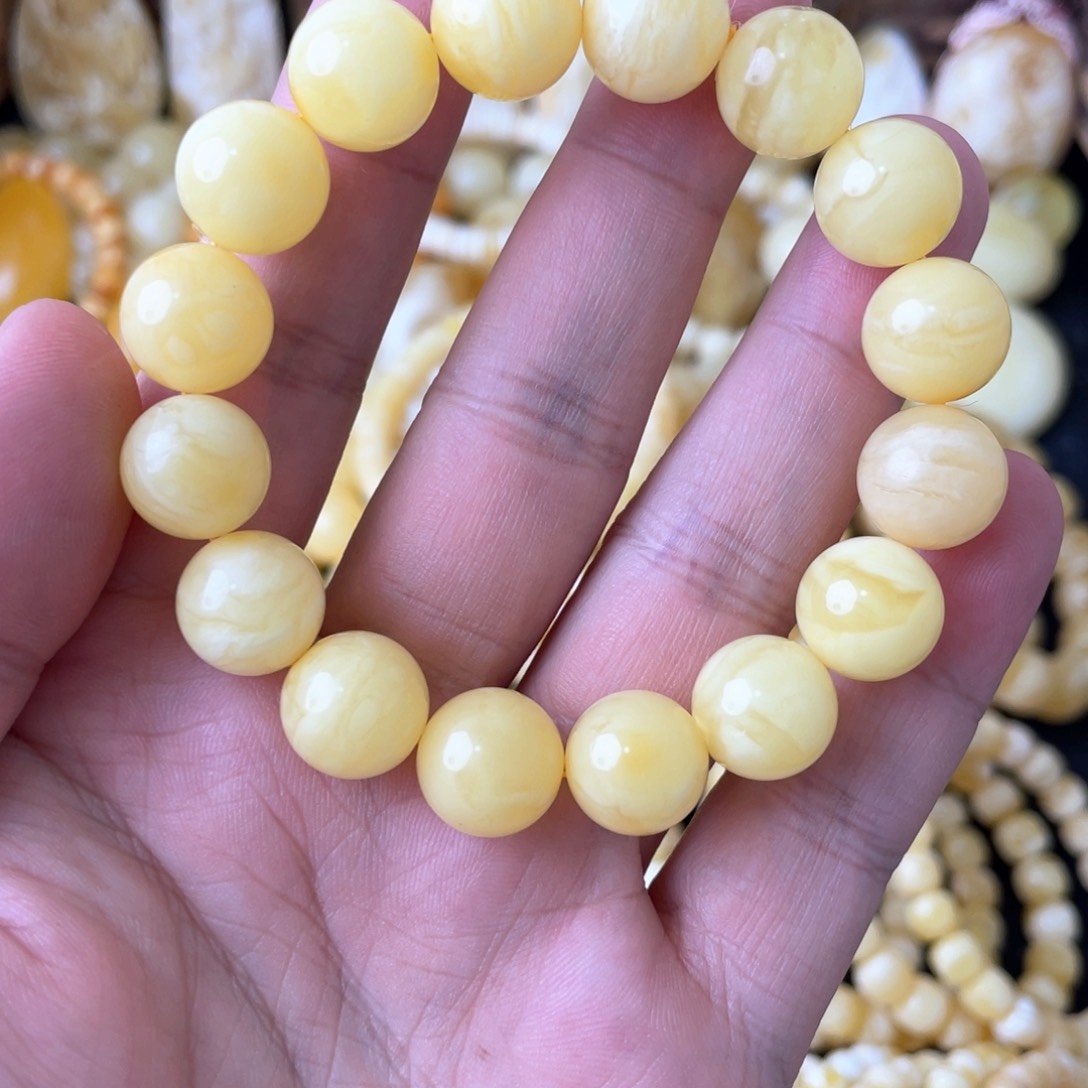 琥珀手串未镶嵌霸****）12+俄料妖白花圆珠手串