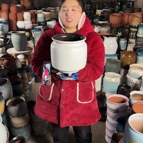 口21高22瑕疵盆子。