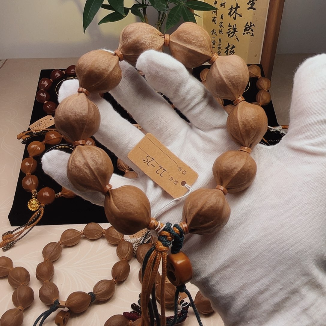 奔***脚吊坠橄榄核梅林铁核22*25