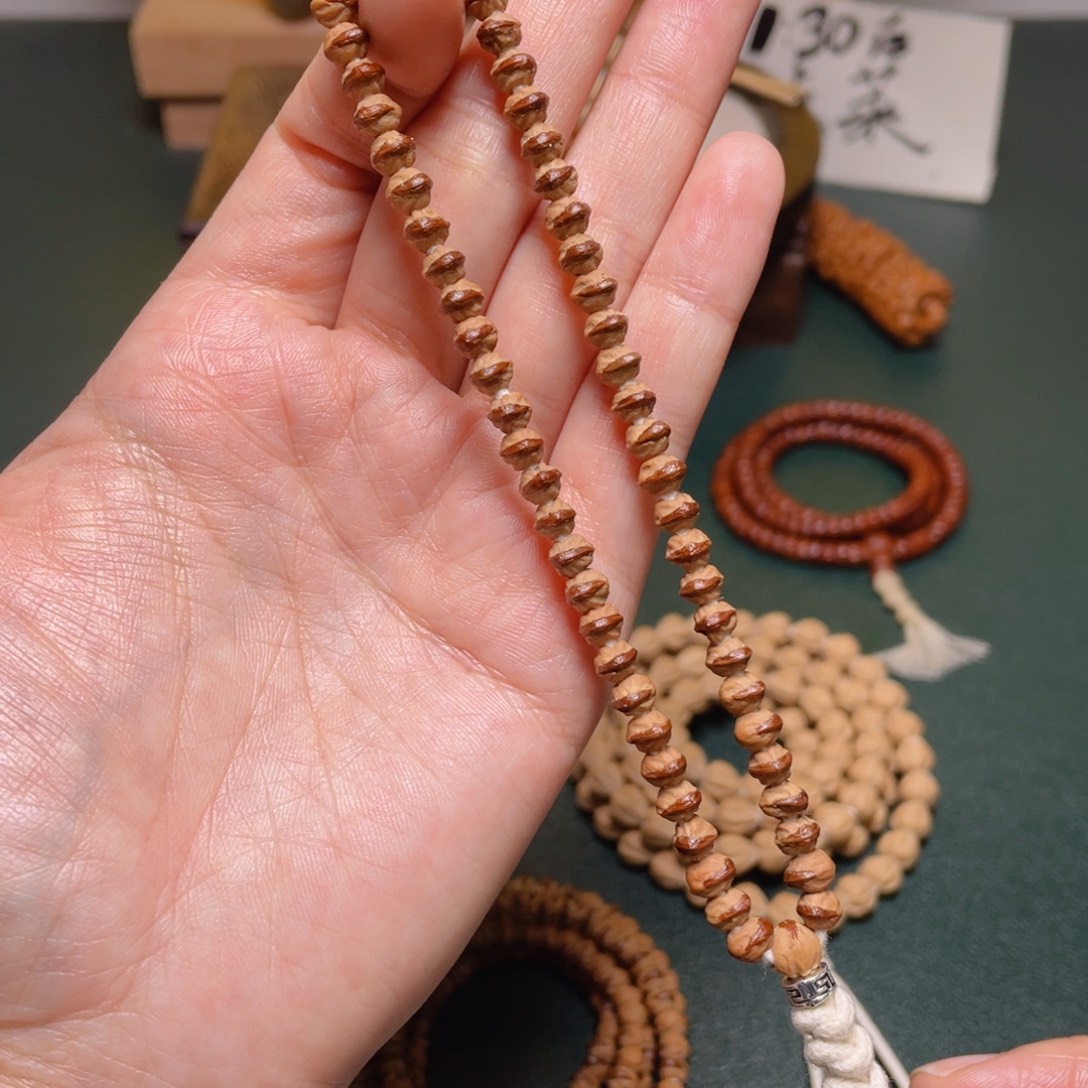 柏香籽/百香籽吊坠小凤眼手持