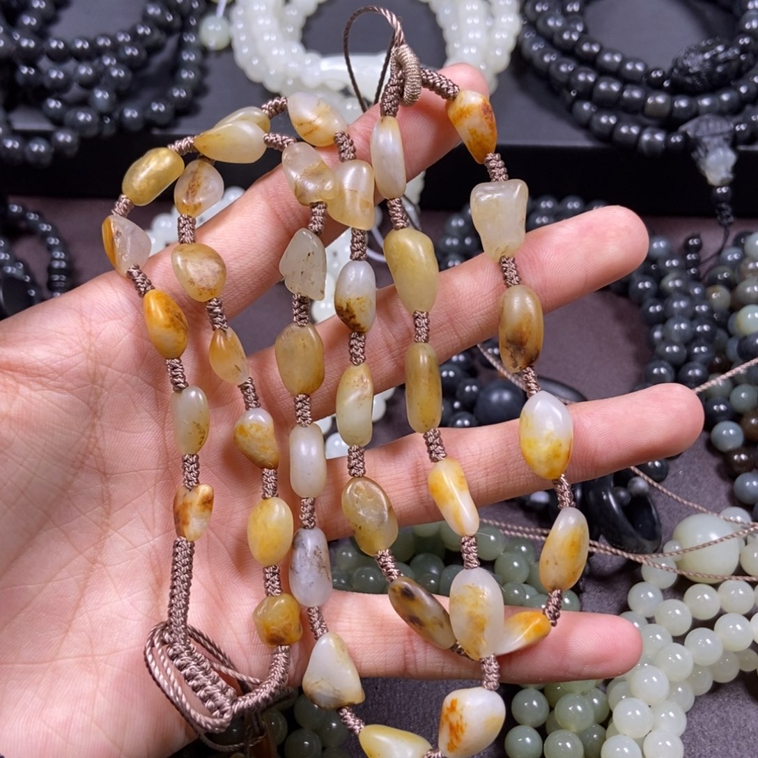 觀***奇和田玉未镶嵌把件