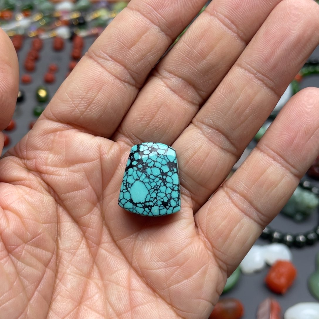 那***儿绿松石未镶嵌颈饰无事牌