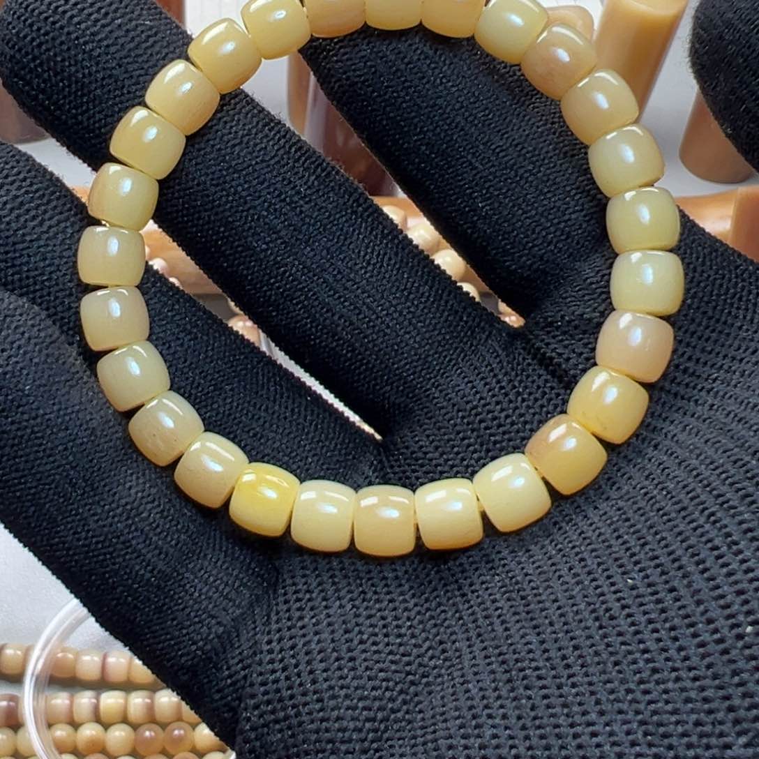 驼骨吊坠T****a精品驼马骨手串