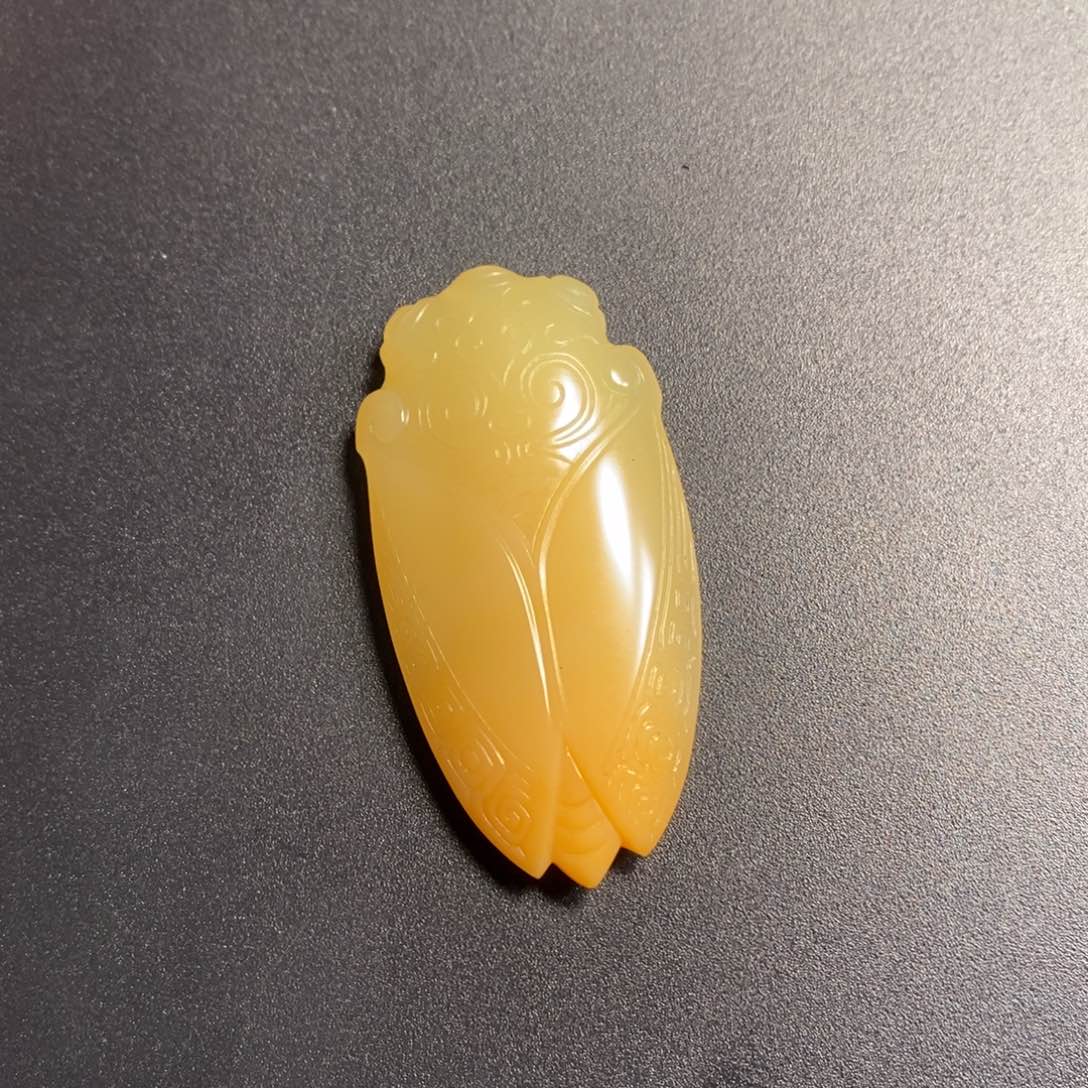 高***洞石英质玉（黄龙玉）未镶嵌颈饰