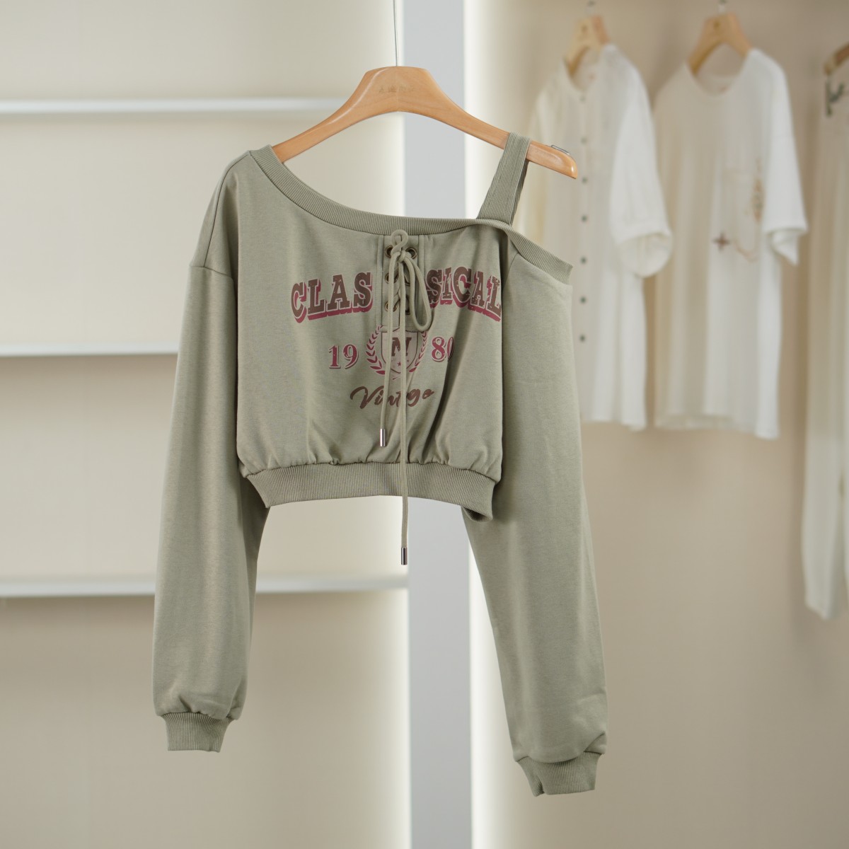 麦迪尚品【文M】5121647 春秋时尚性感单边露肩绑带装饰上衣女