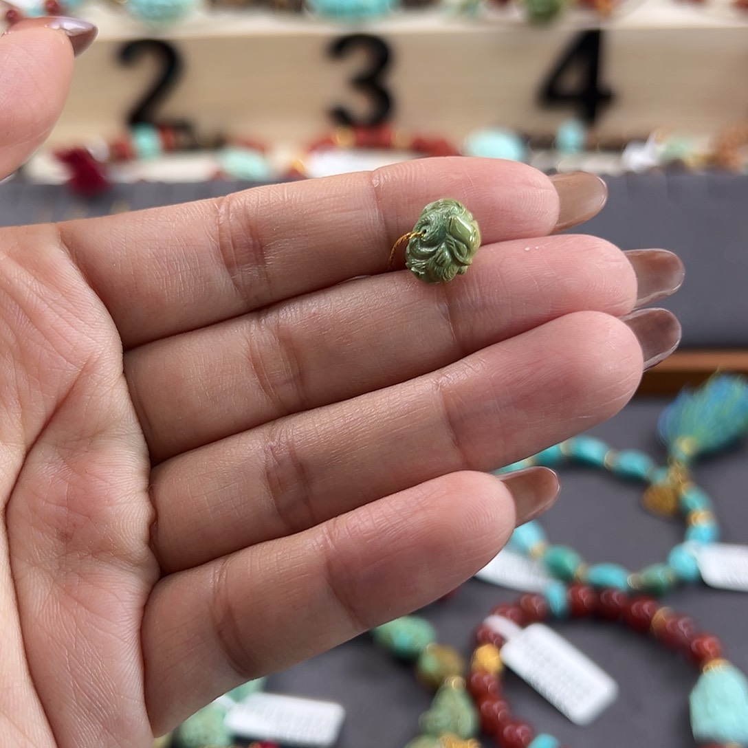 绿松石未镶嵌把件凤九墩子