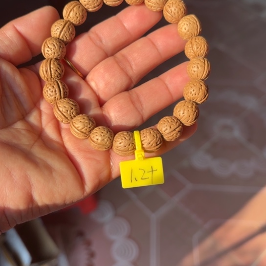 用***3木质野生桃核手串