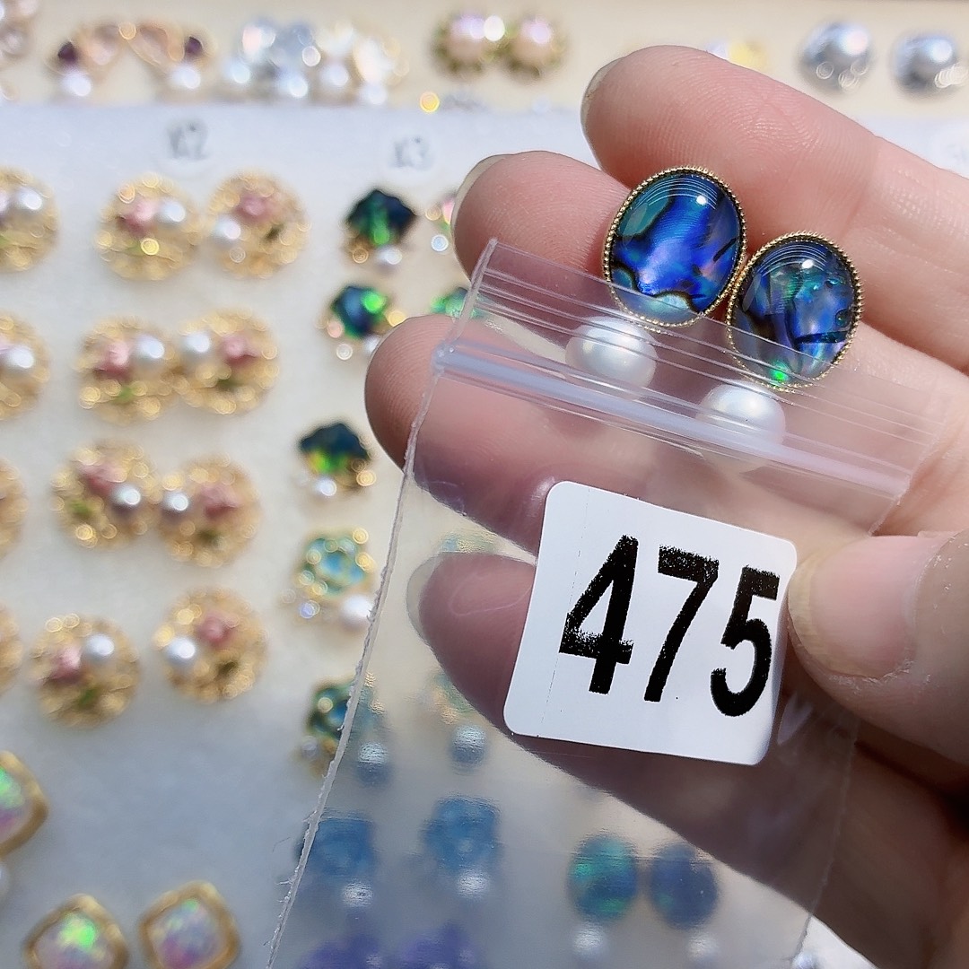 遇***己淡水珍珠耳饰合金