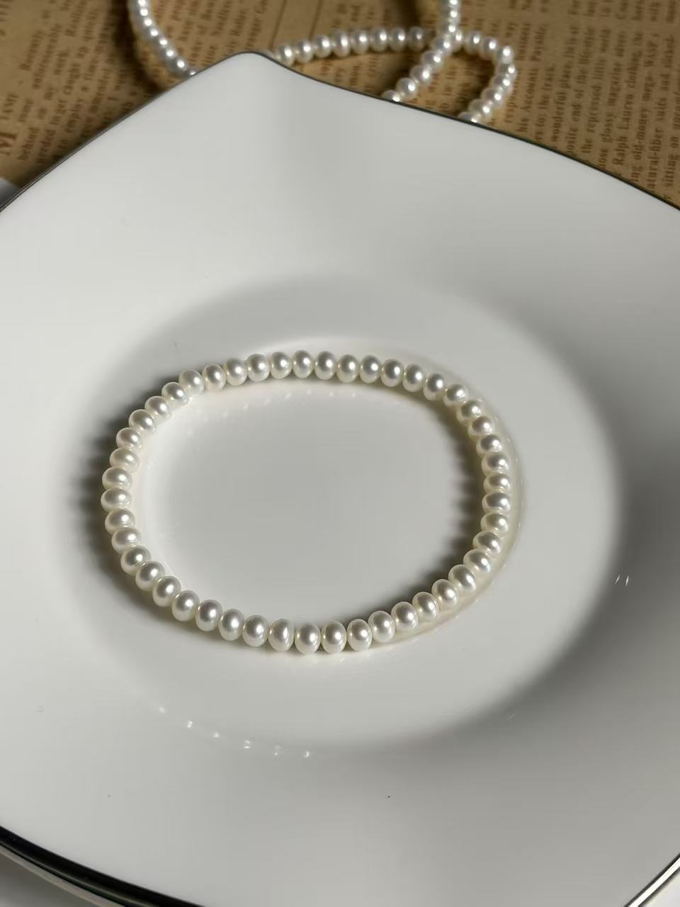 嵘澜4.5mm左右天然淡水无核真珍珠扁圆极微瑕叠戴白炫彩亮手串