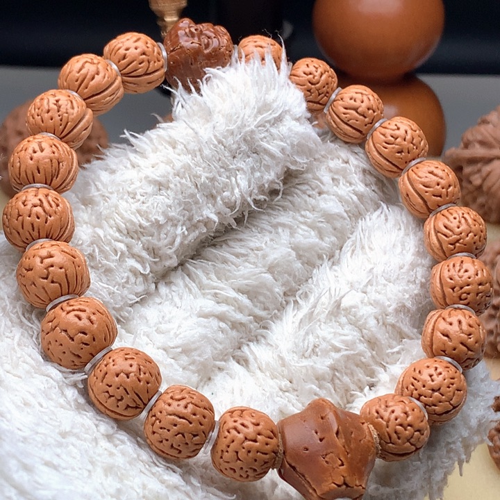 把件文玩核桃野生桃核玉女脐