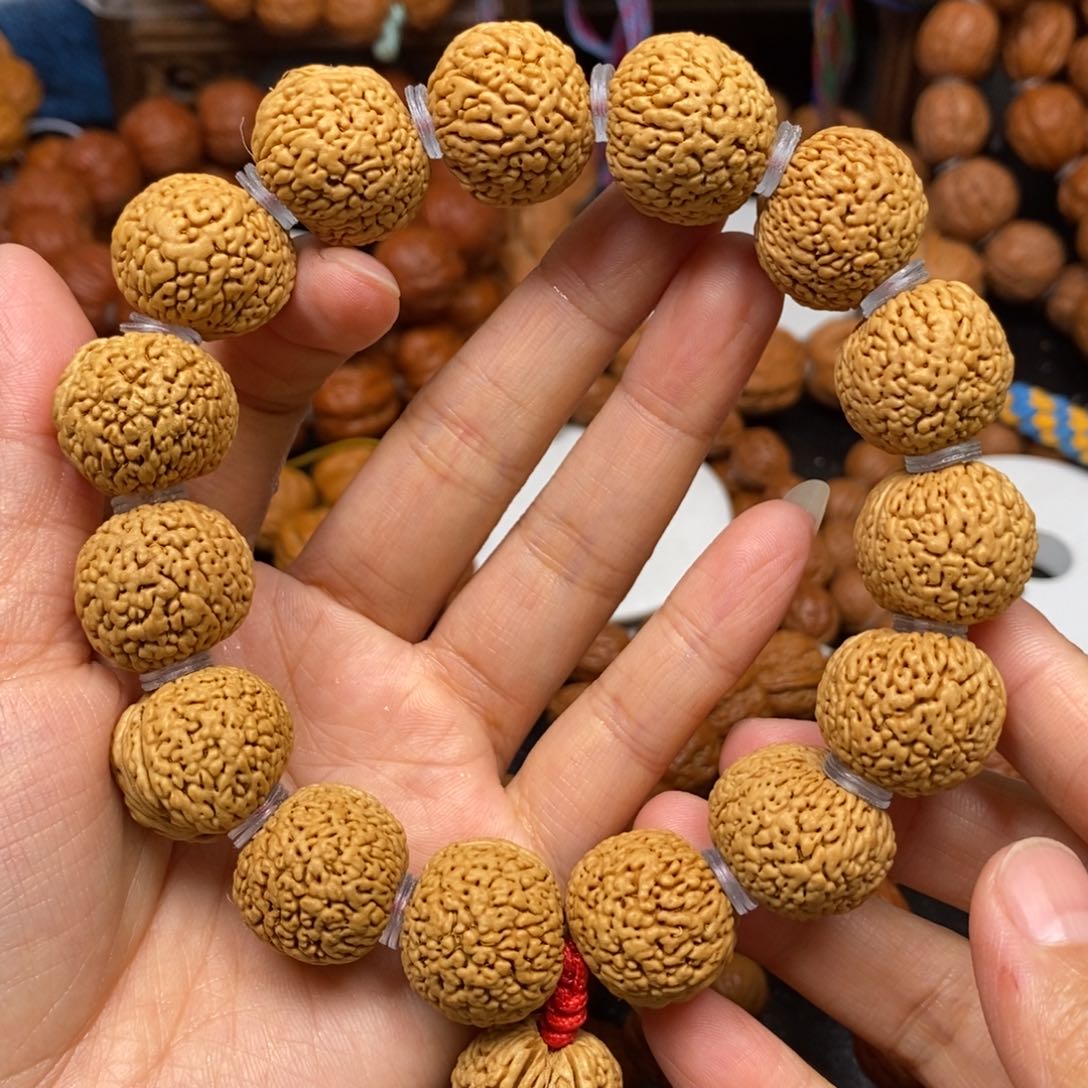 桃核手串龙鳞凤尾