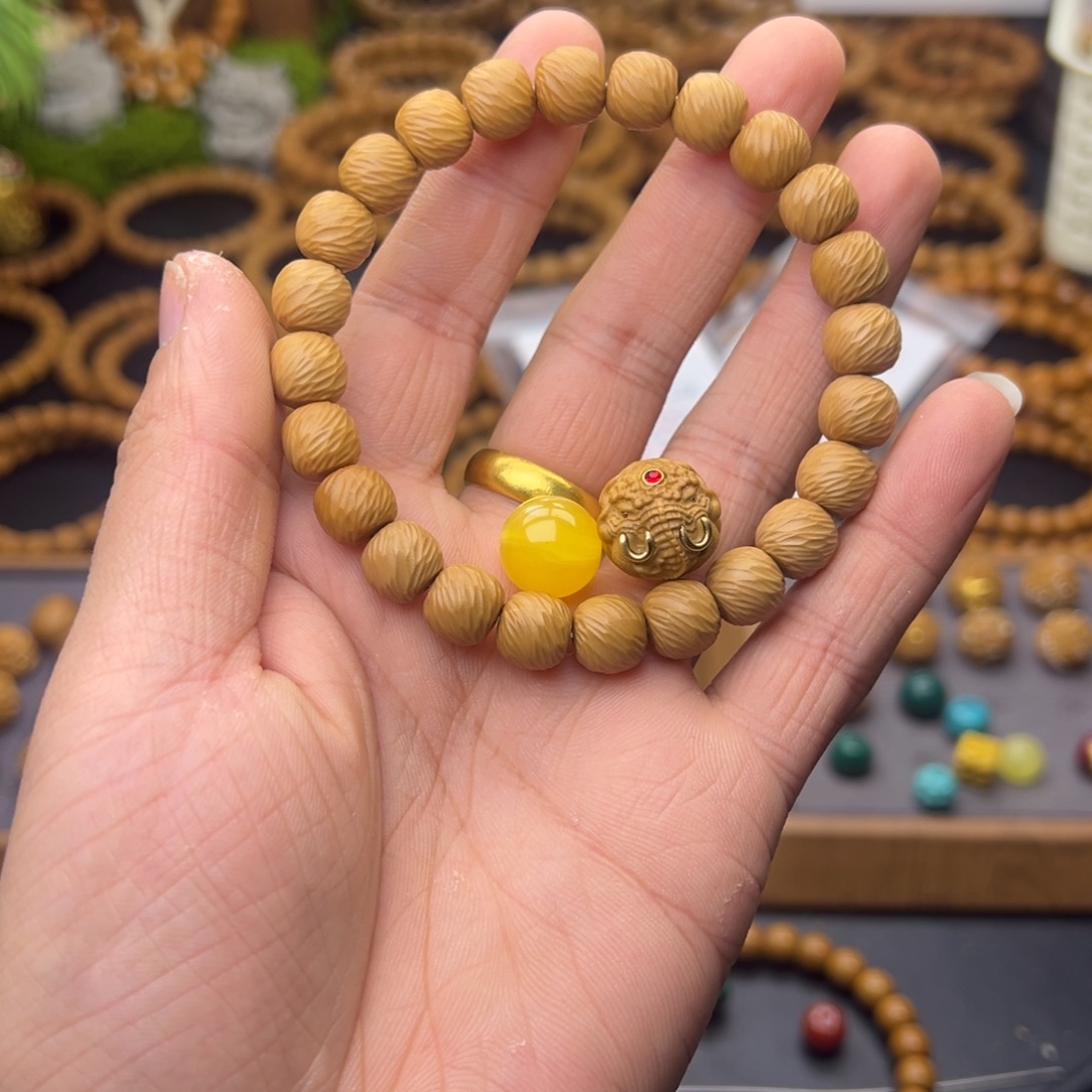 陈***寻吊坠猴头核桃云锦➕两角象