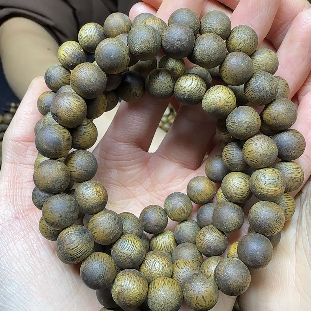 李***李沉香沉香碎屑+0.9圆珠多圈38克加