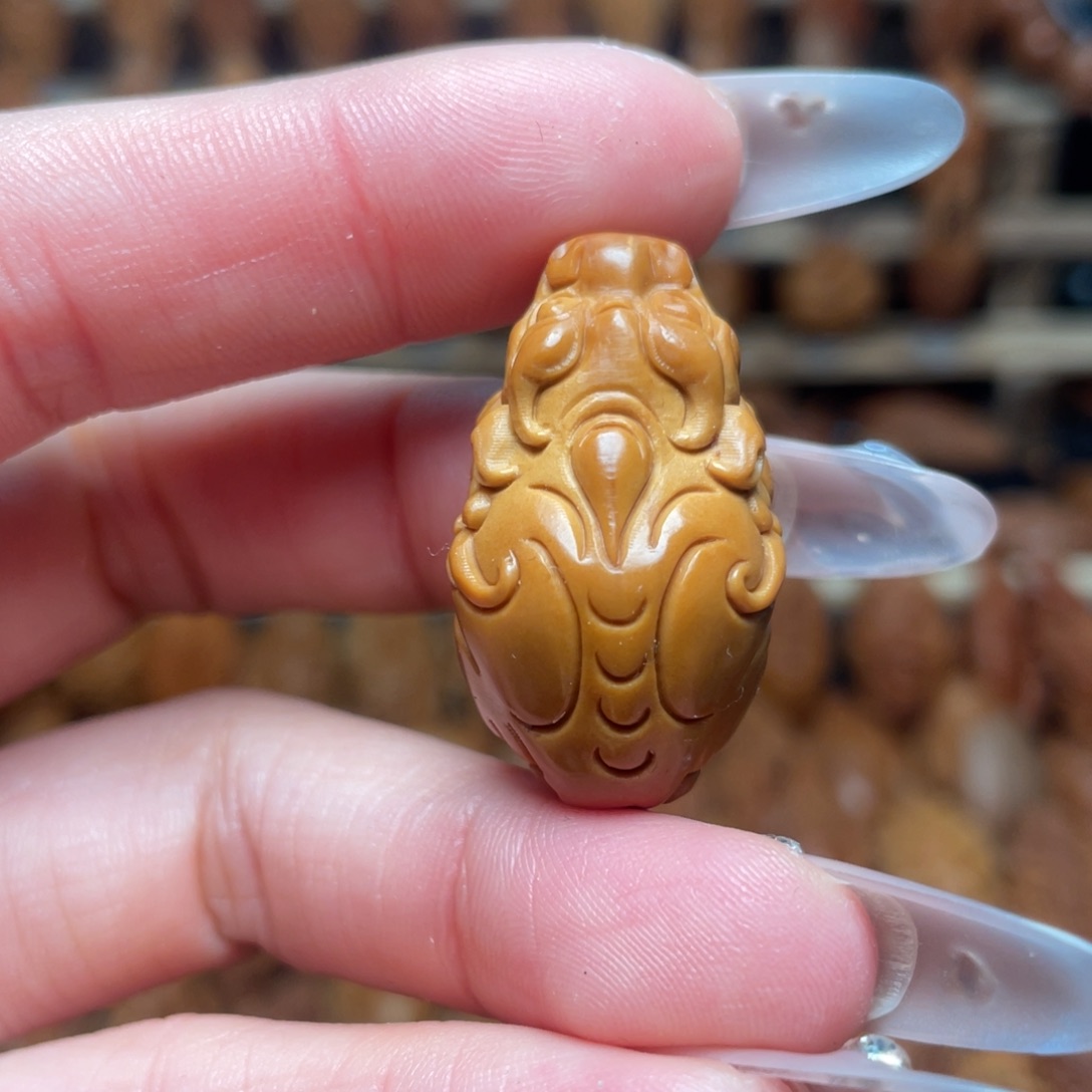 橄榄核把件独角貔貅