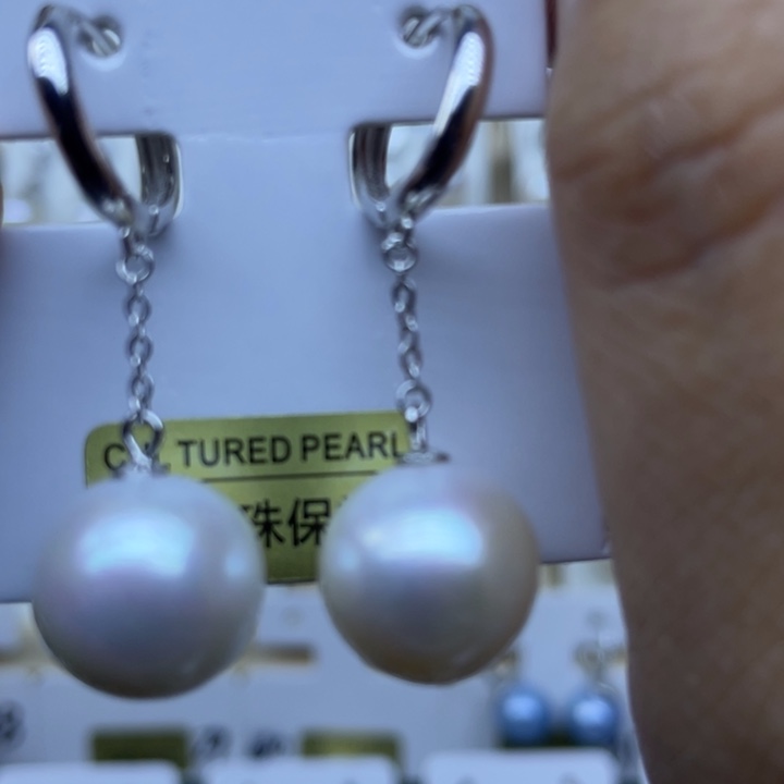 刘***利淡水珍珠银S925镶嵌耳饰