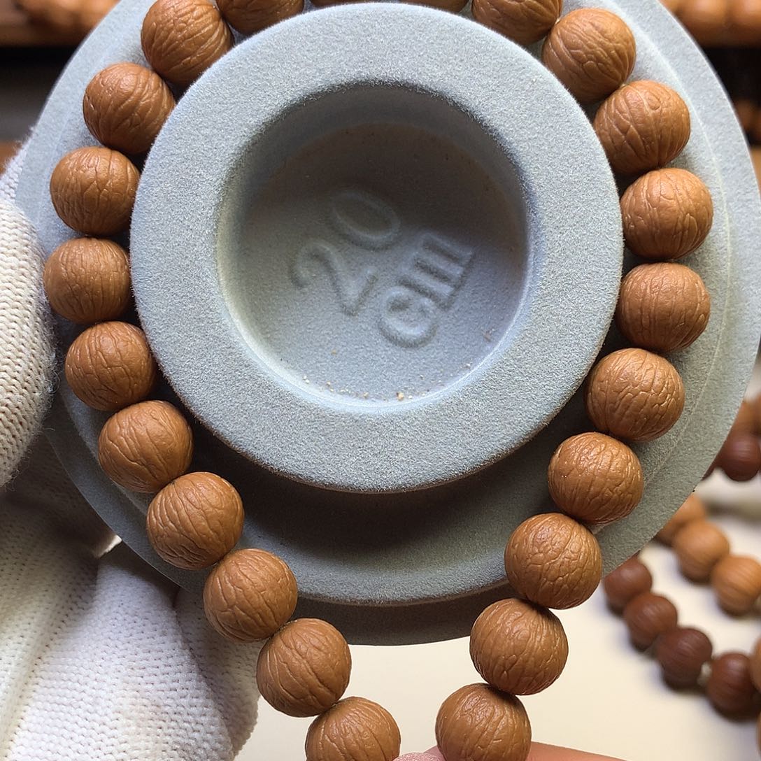 喜***。吊坠猴头核桃12凤羽全品手持