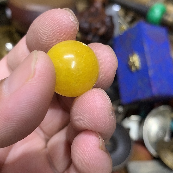 渔***嗳一物一拍黄色珠珠