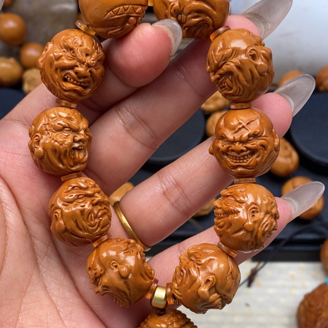 橄榄核手串橄榄核雕工艺啊啊啊