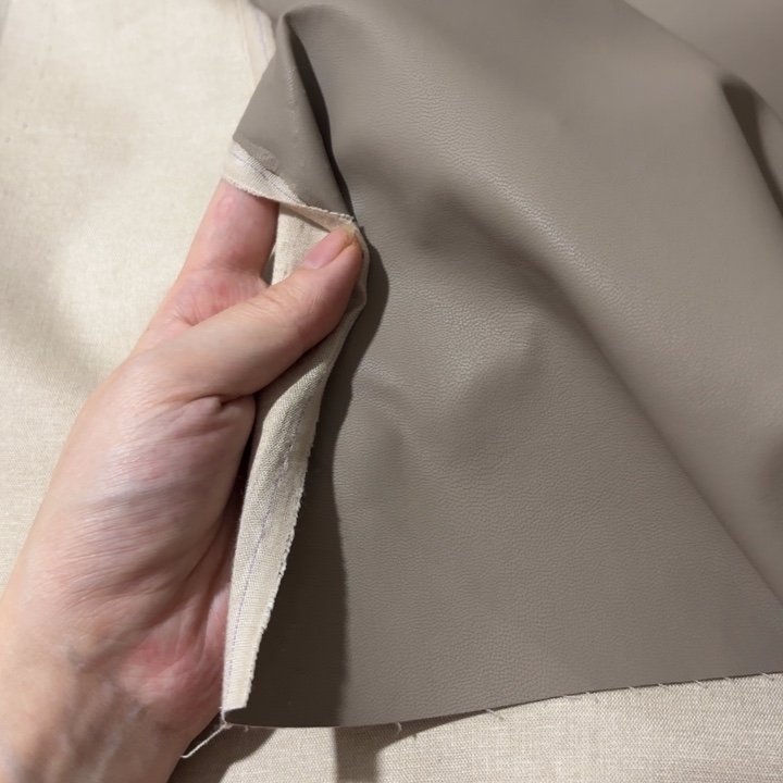 混纺奶茶灰棉底皮1米。   