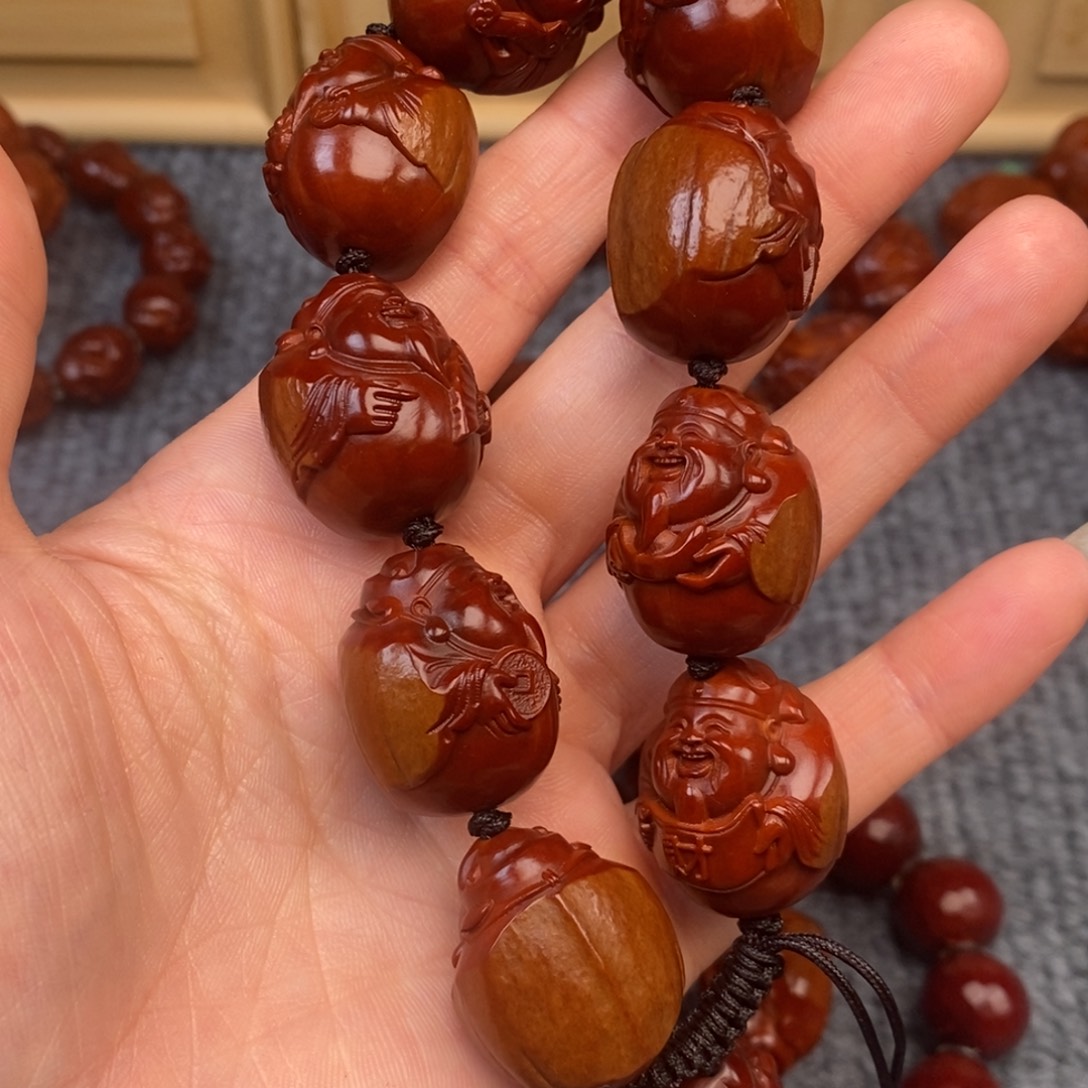 孙***振橄榄核手串/手链包衣财神