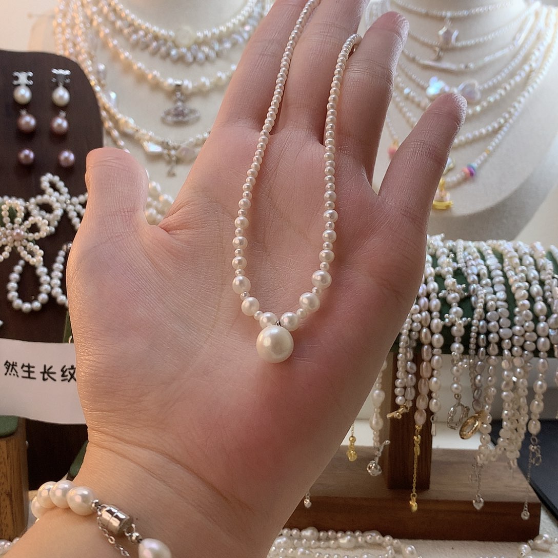 大***喵颈饰淡水珍珠银S925镶嵌微笑