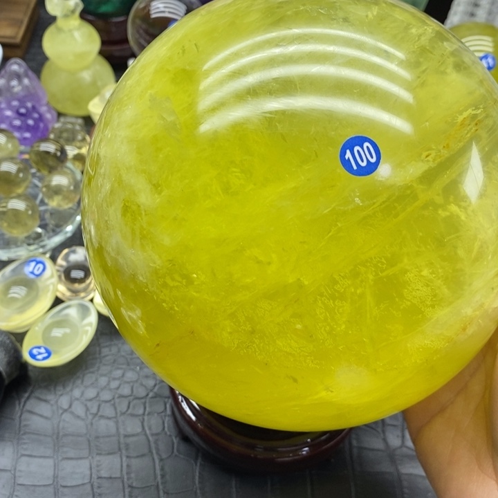 用***7石材天然黄水晶球