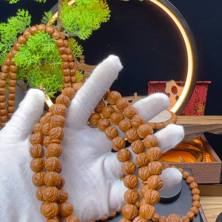 桃核吊坠T****部野生桃核小龙纹1.1脖挂