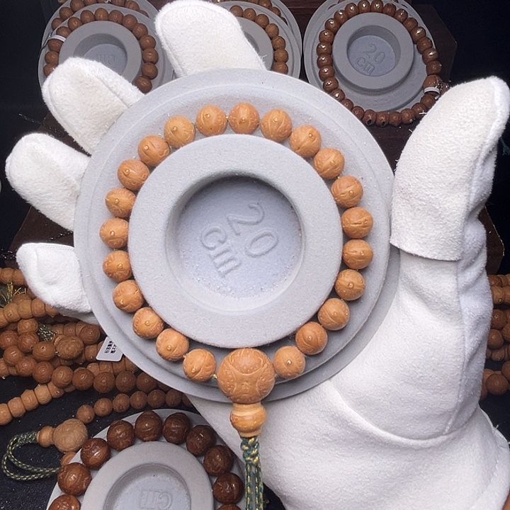 不***酒凤眼菩提手串9.7-10mm实心粉红皮