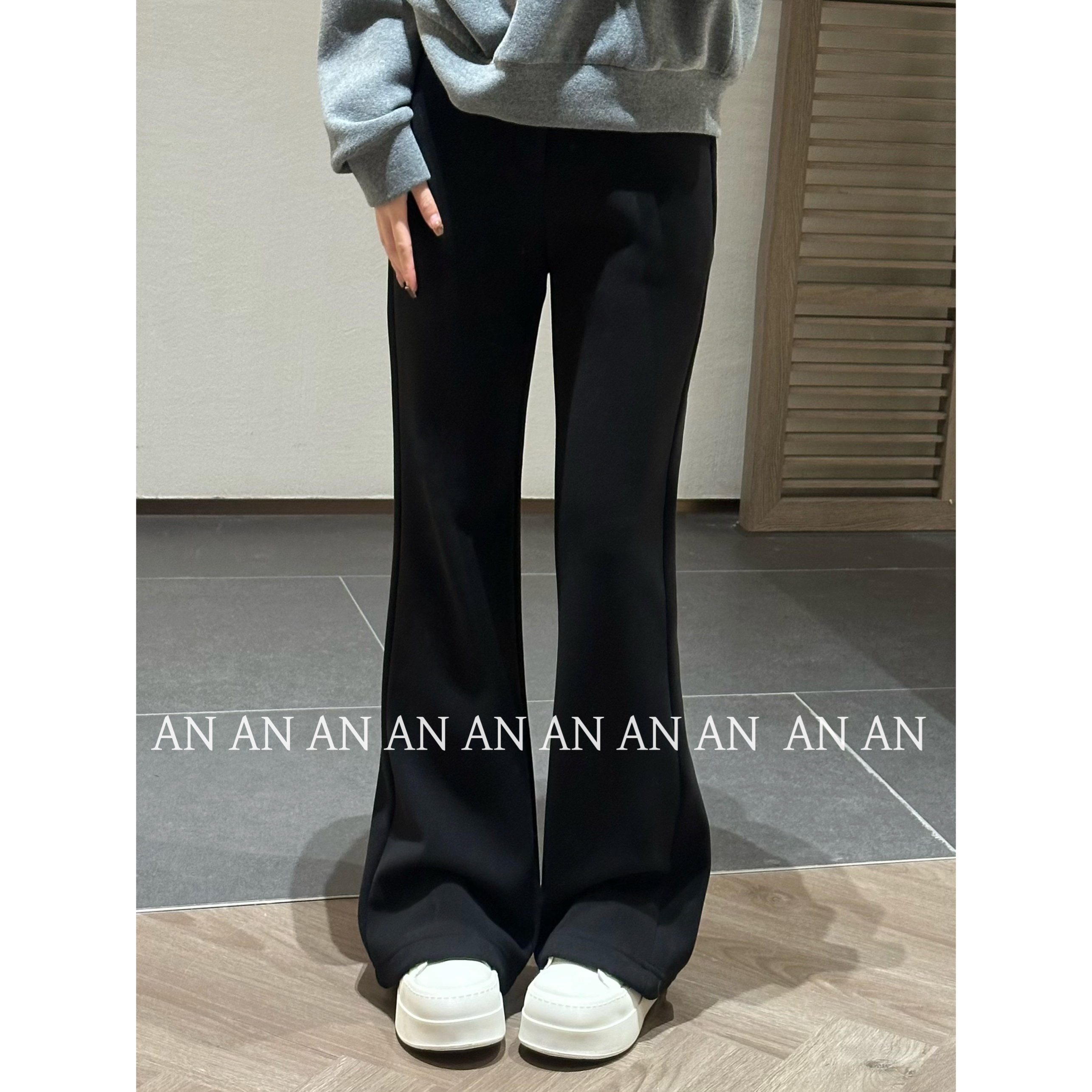 C11258时尚气质舒适宽松显瘦一扣纯色休闲加绒微喇裤