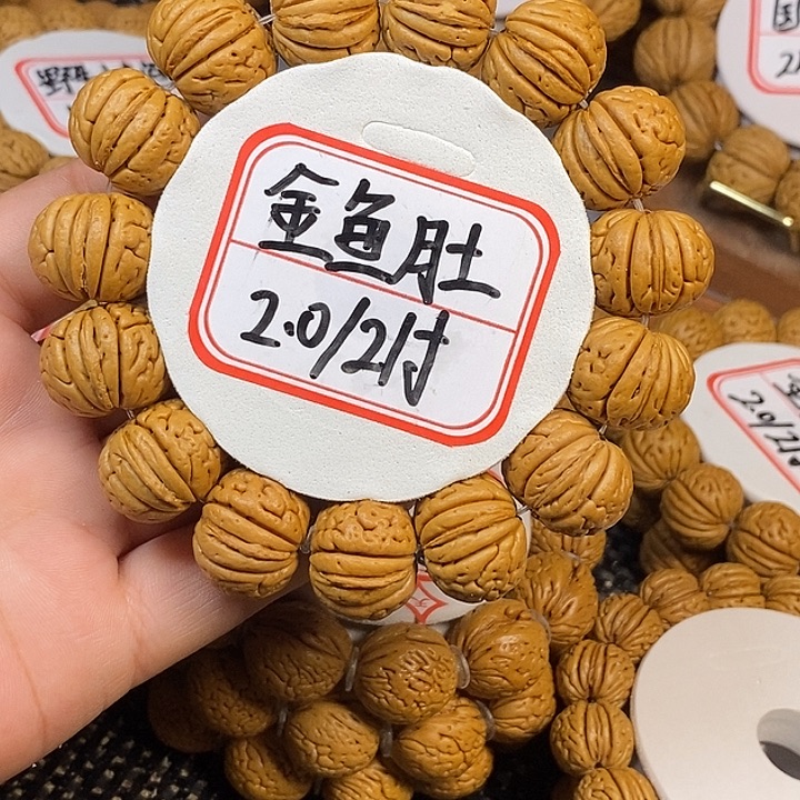 无***哥手串桃核金鱼肚2.0/21