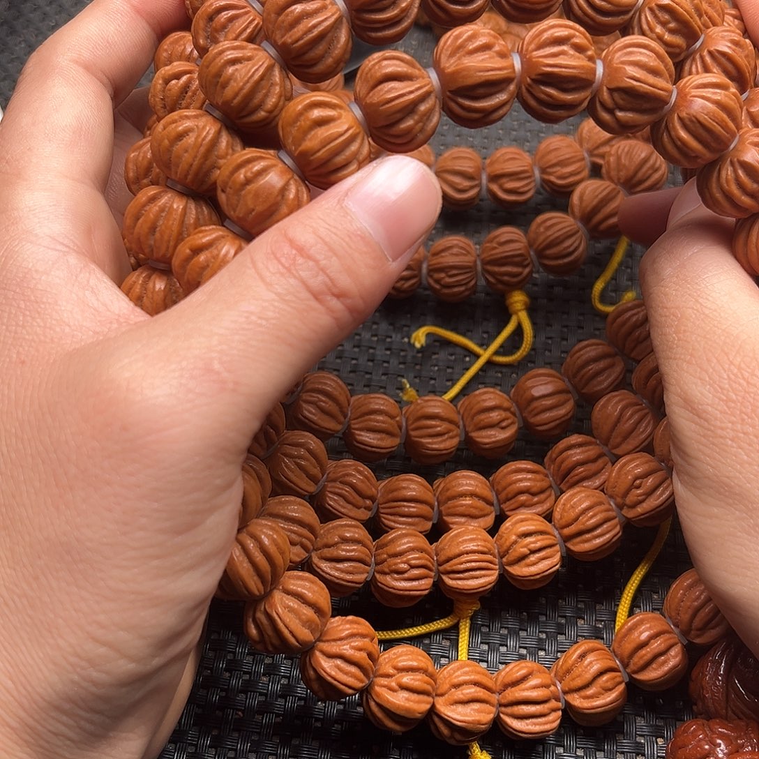 吊坠桃核八道金手持