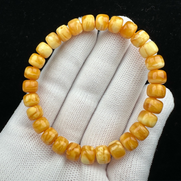 R9989天然蜜蜡鸡油红妖花手串 7.6*6.2mm支持鉴定 假一罚四