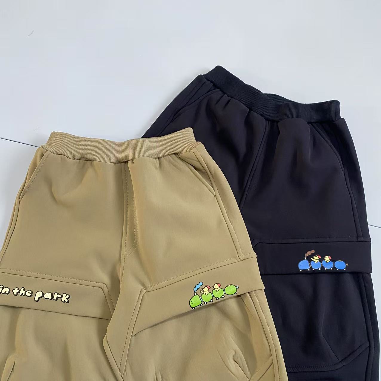 25新款趣味盖袋加绒防风裤男女童立体工装裤