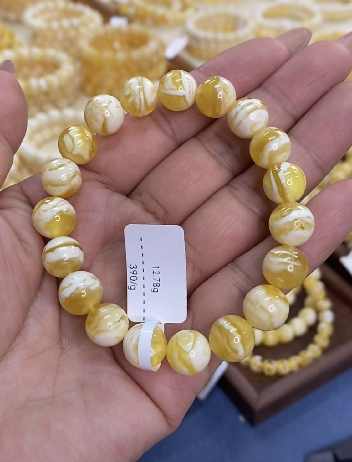 俄料金瓷白花圆珠蜜蜡手串