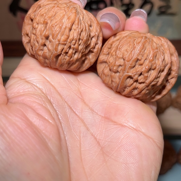 泽***林文玩核桃吊坠磨盘