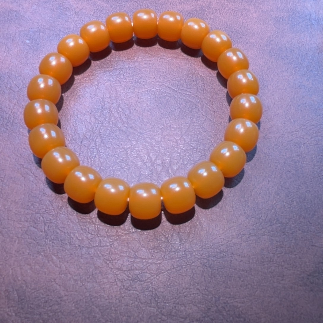 少***说石英质玉（缅黄）未镶嵌老型单珠