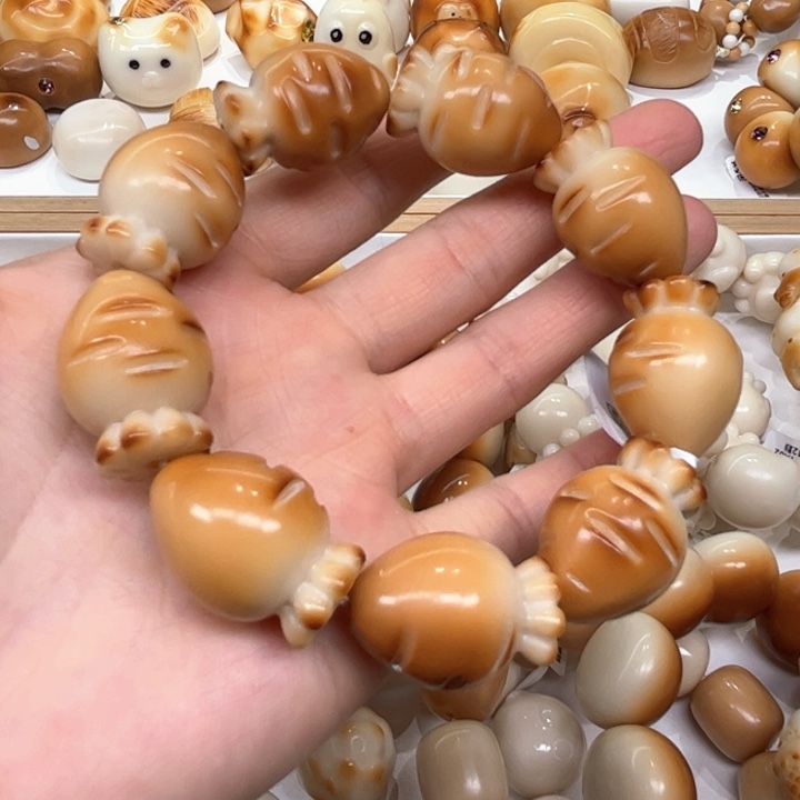 白玉菩提把件4.21.55象牙果炭烤胡萝卜