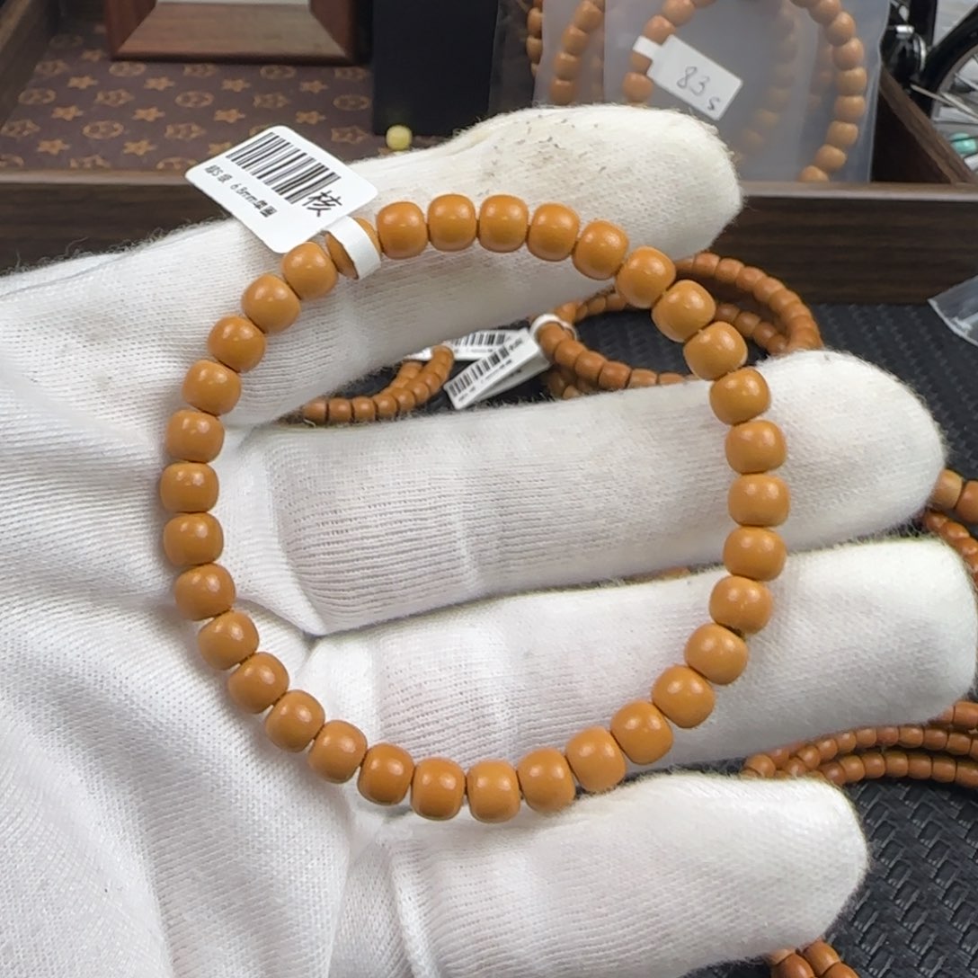 橄榄核吊坠超S级6.8mm老挝核尖老型单圈