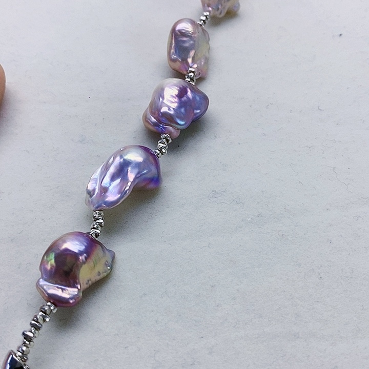 银S925镶嵌耳饰淡水珍珠?**N