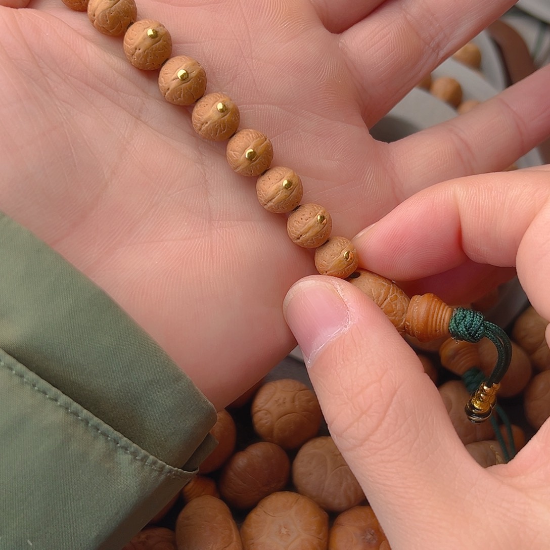 你***。凤眼菩提吊坠凤眼