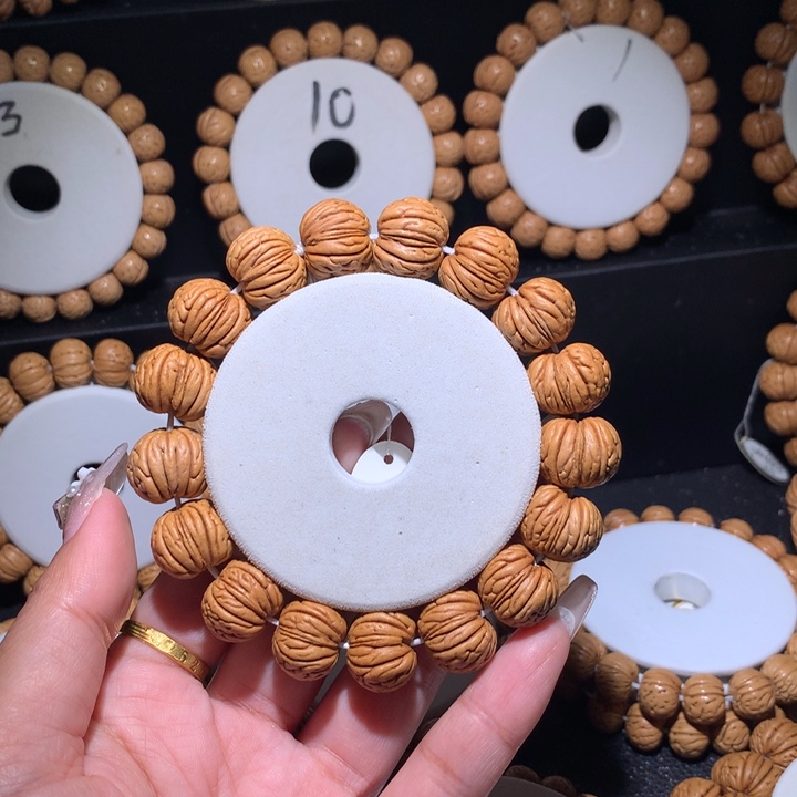 我***呢手串桃核野生大开口