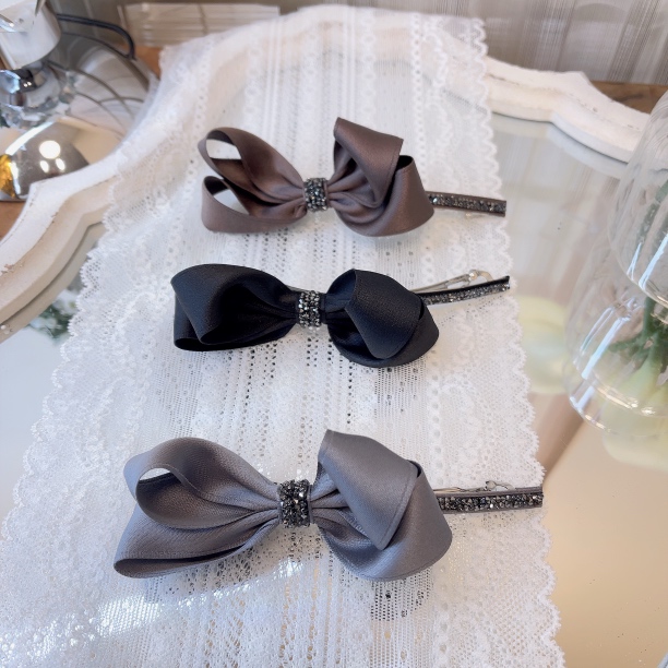 W563韩系设计精致百搭时尚简约蝴蝶结砂糖弹簧夹